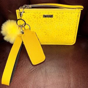EUC Kate Spade Yellow Laser Cut Floral Wristlet